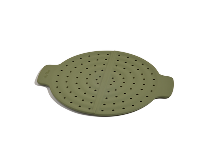 Olive green, round silicone steamer insert with side handles and evenly spaced holes, ideal for splatter prevention when cooking with your Fearless Fry.