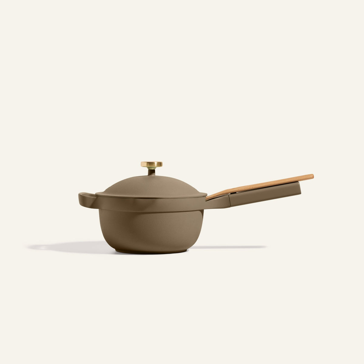 The Mini Perfect Pot 2.0 is a brown nonstick pot with a lid and wooden handle, shown against a plain light background.