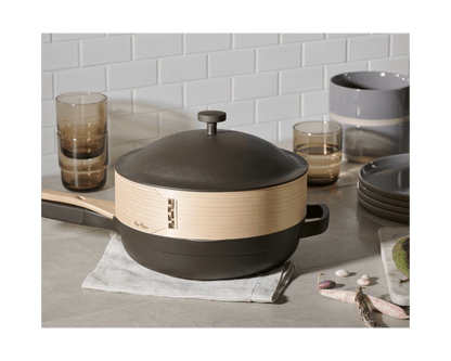 Spruce Steamer Basket on top of Always Pan ceramic nonstick frying pan