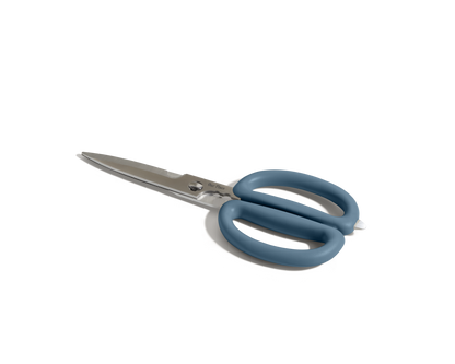 The Shear Genius kitchen shears, featuring stainless steel blades, large blue handles, and a multifunctional design, are shown on a white background.