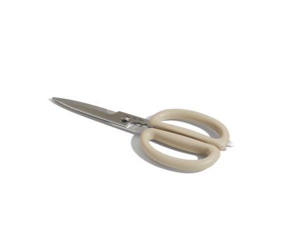 Shear Genius stainless steel kitchen shears with beige, oval handles and a multifunctional design are displayed on a white background.