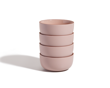 The Soup Bowls set includes four stackable pink ceramic bowls, arranged on a white background with a soft shadow to the left.