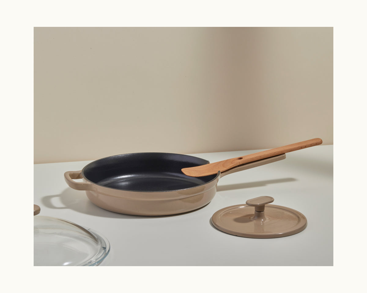 Beige Grill Press paired with a beige Cast Iron Always Pan