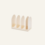 Universal Storage cream-colored kitchen organizer with four arched dividers for upright cookware storage.