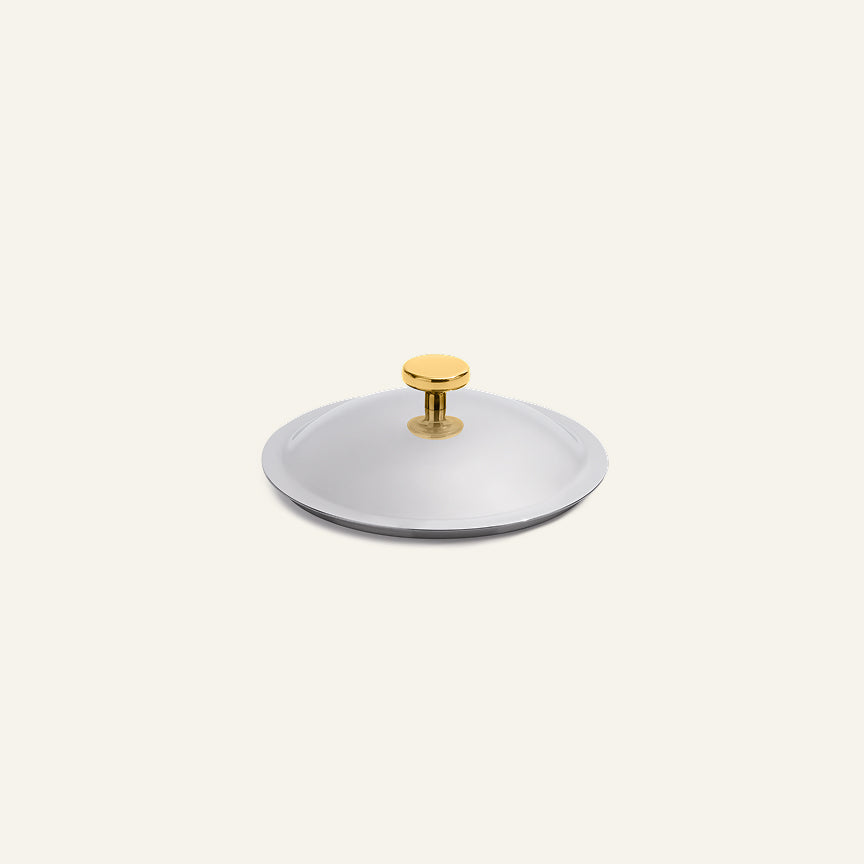 A round, stainless steel Titanium Pro Lid (Mini) with a small gold-toned handle.