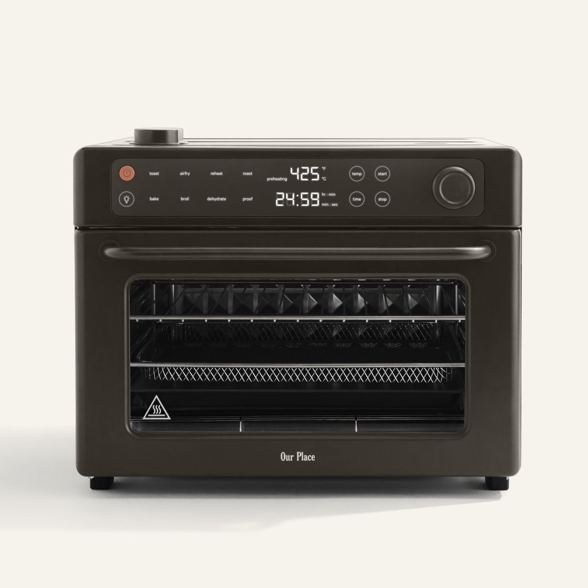 Black oven with digital display on a white background