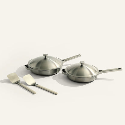 two titanium fry pan on white background